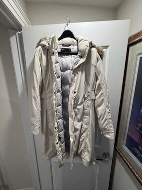 Marmot long puffer coat with faux fur hood